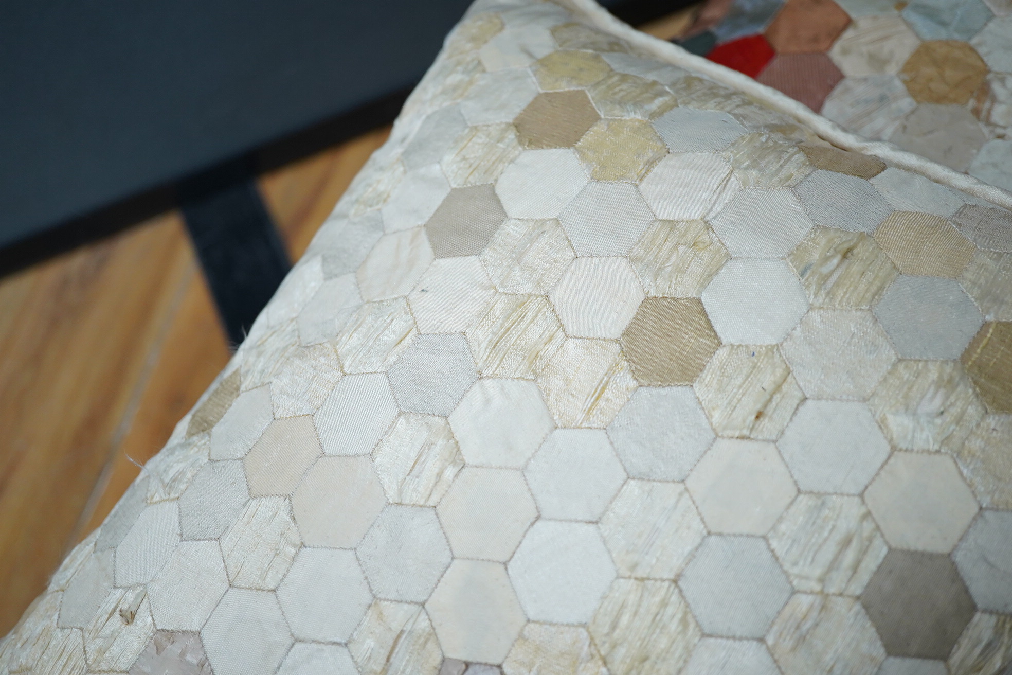 Three various sized 19th century patchwork panels and two patch worked cushions, for using as restoration fabric for larger damaged quilts.